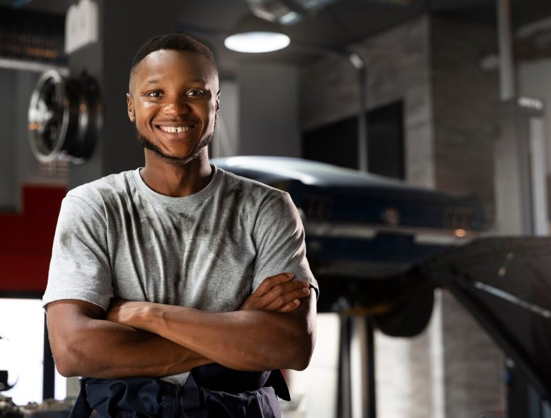 young-worker-car-workshop_52683-90906