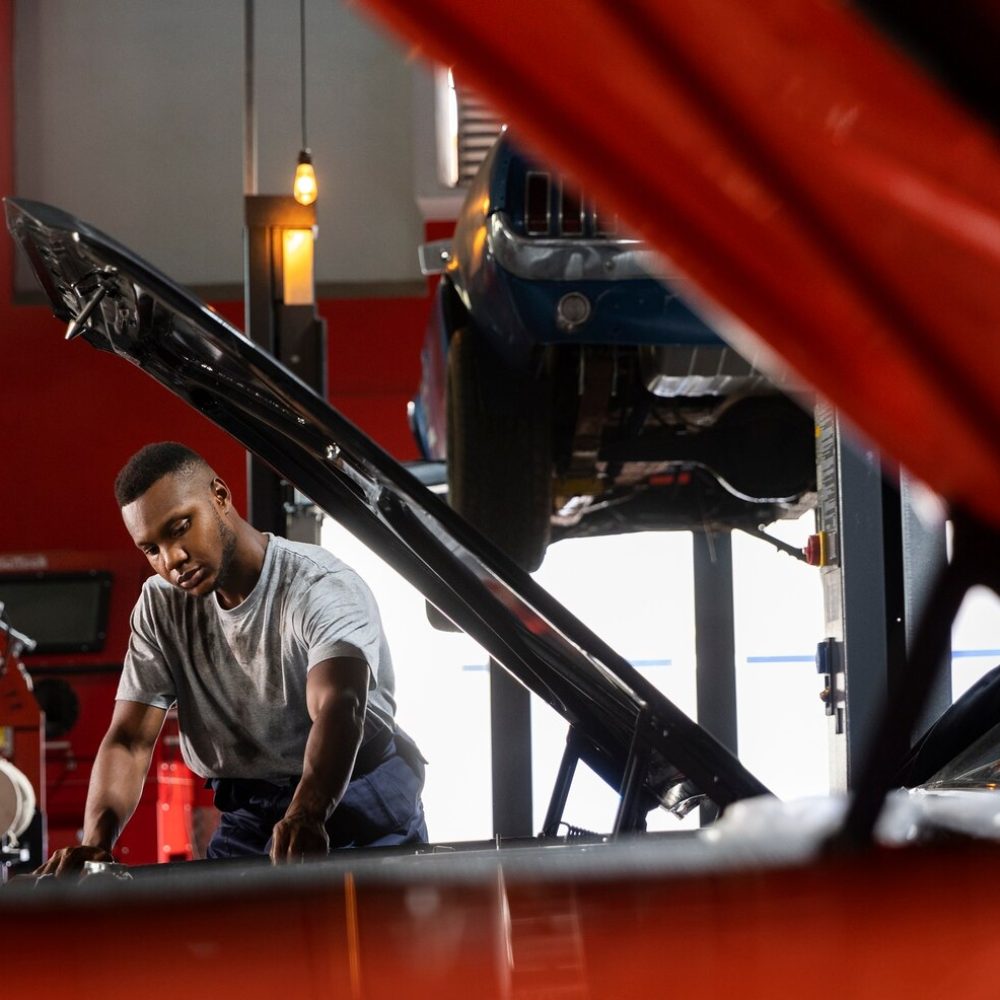 young-worker-car-workshop_52683-90908